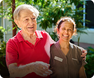 Whiddon home Care worker with a client 