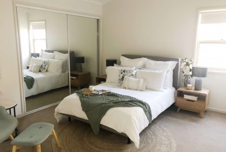 A modern bedroom in Whiddon's Redhead Retirement Village, an aged care home in Newcastle, NSW.