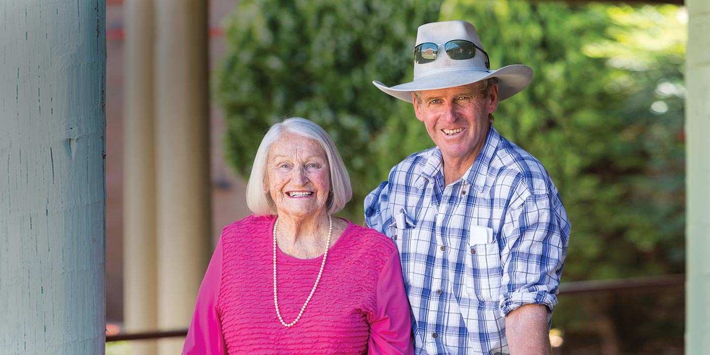 Two residents smiling together at Whiddon's residential care home in Walgett, which provides health services to older Australians.