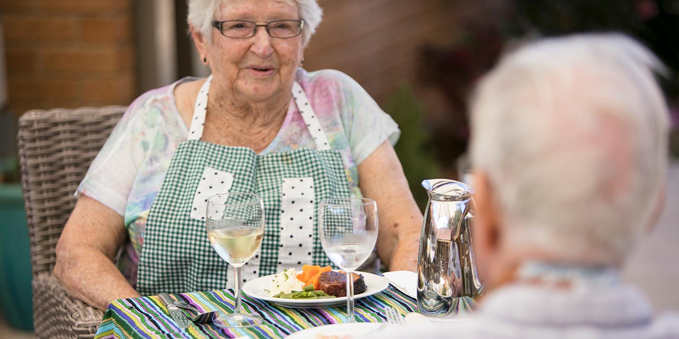 A group of Whiddon residents enjoying lunch together at Whiddon Hornsby's aged care home.