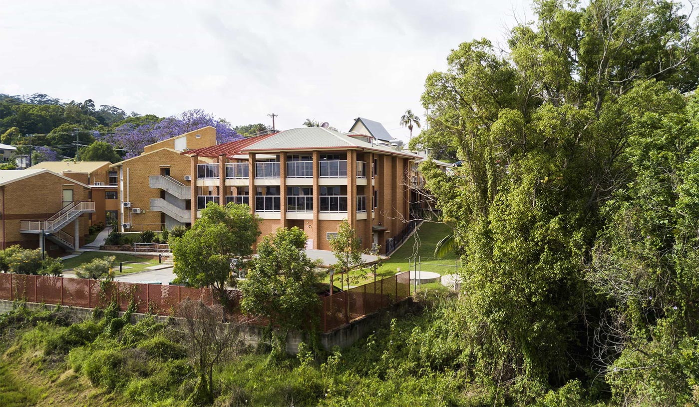 Whiddon Maclean's residential care home, featuring a spacious backyard area.