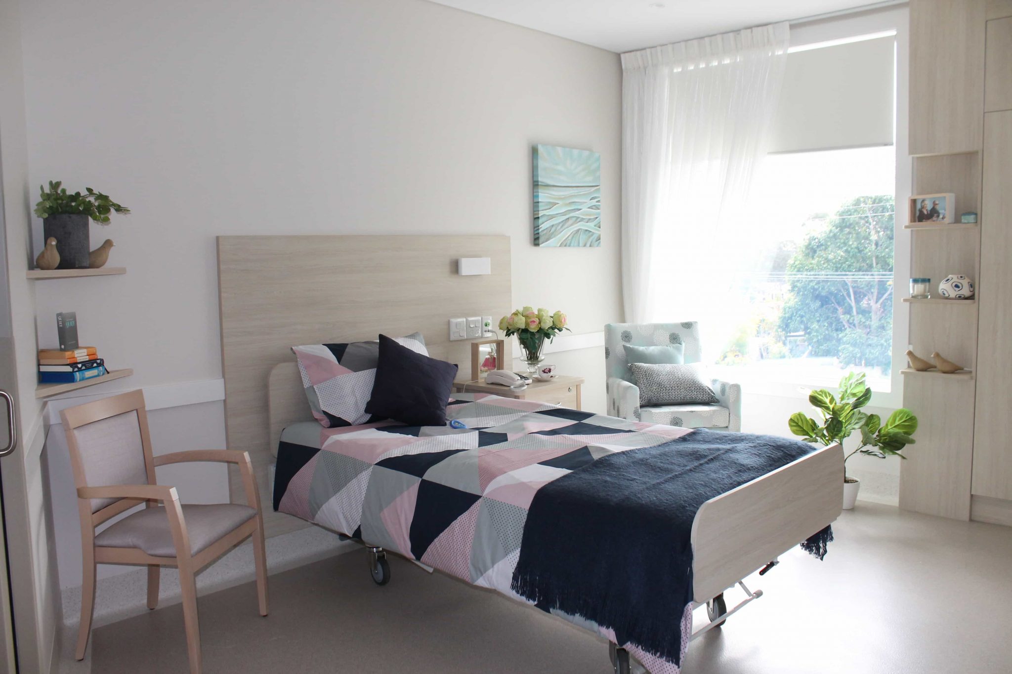 A modern, light-filled bedroom at the Sir David Martin Home inside Whiddon Easton Park, an aged care home in Glenfield.