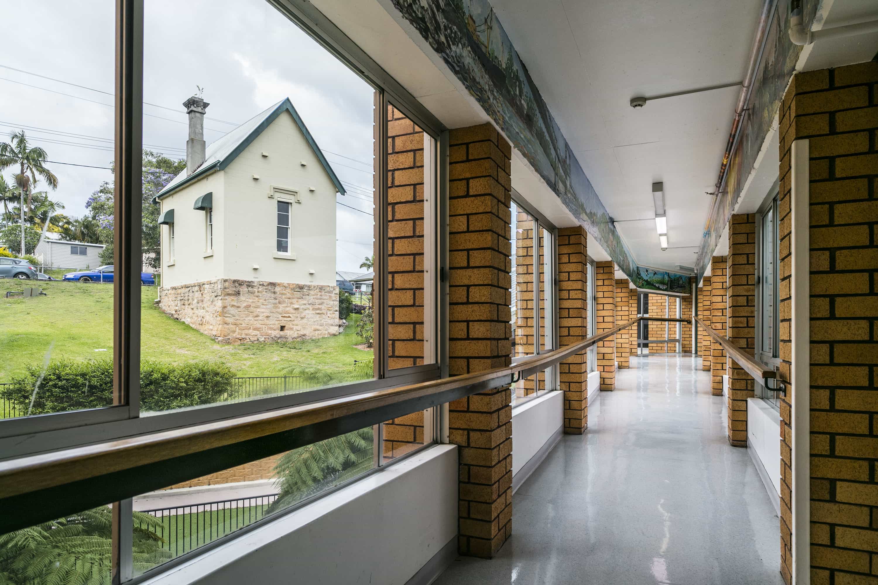 The corridors of Whiddon Maclean's residential care home, filled with natural light which seeps through the windows.