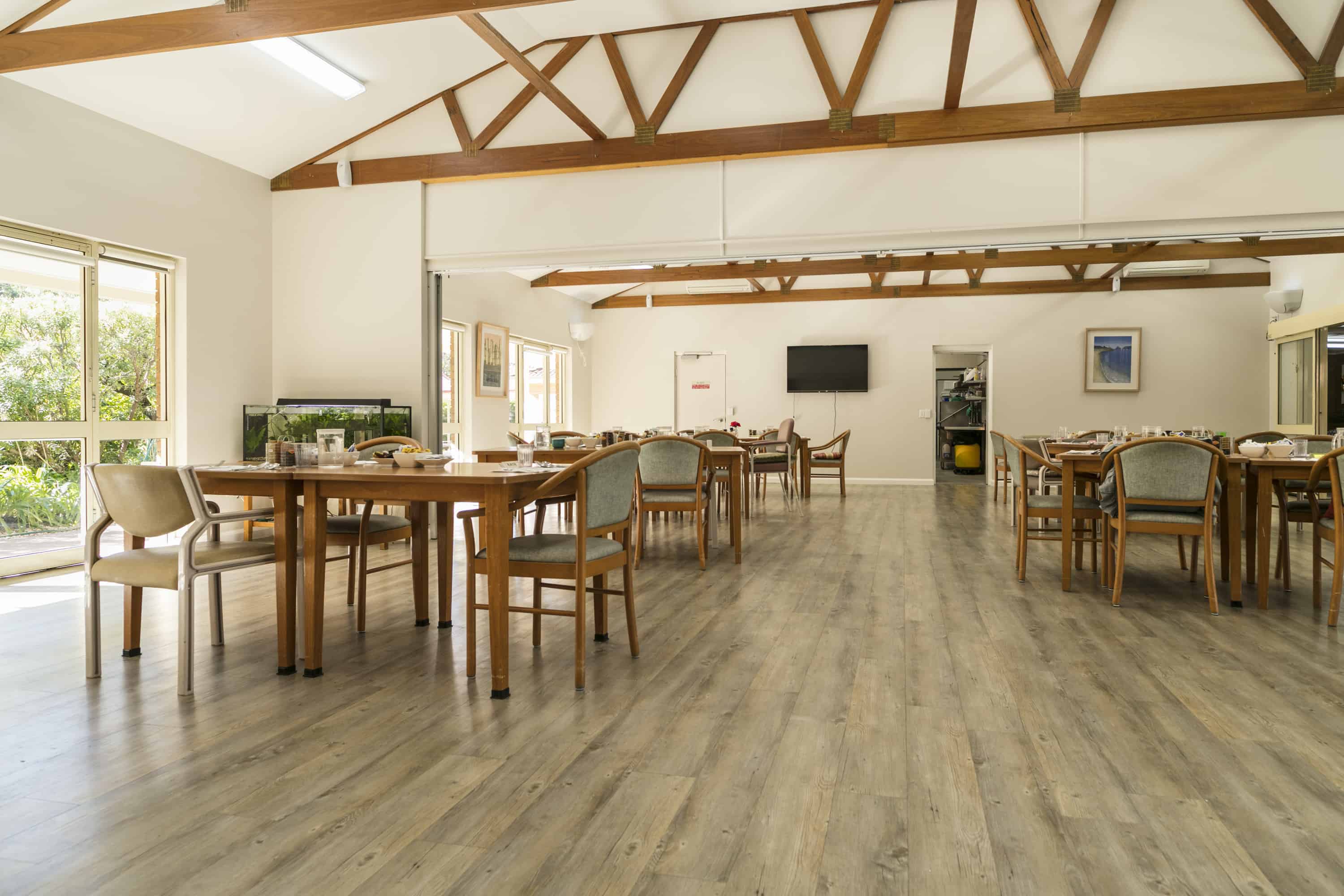 The spacious, light-filled dining area of Whiddon's nursing home in Port Macquarie,