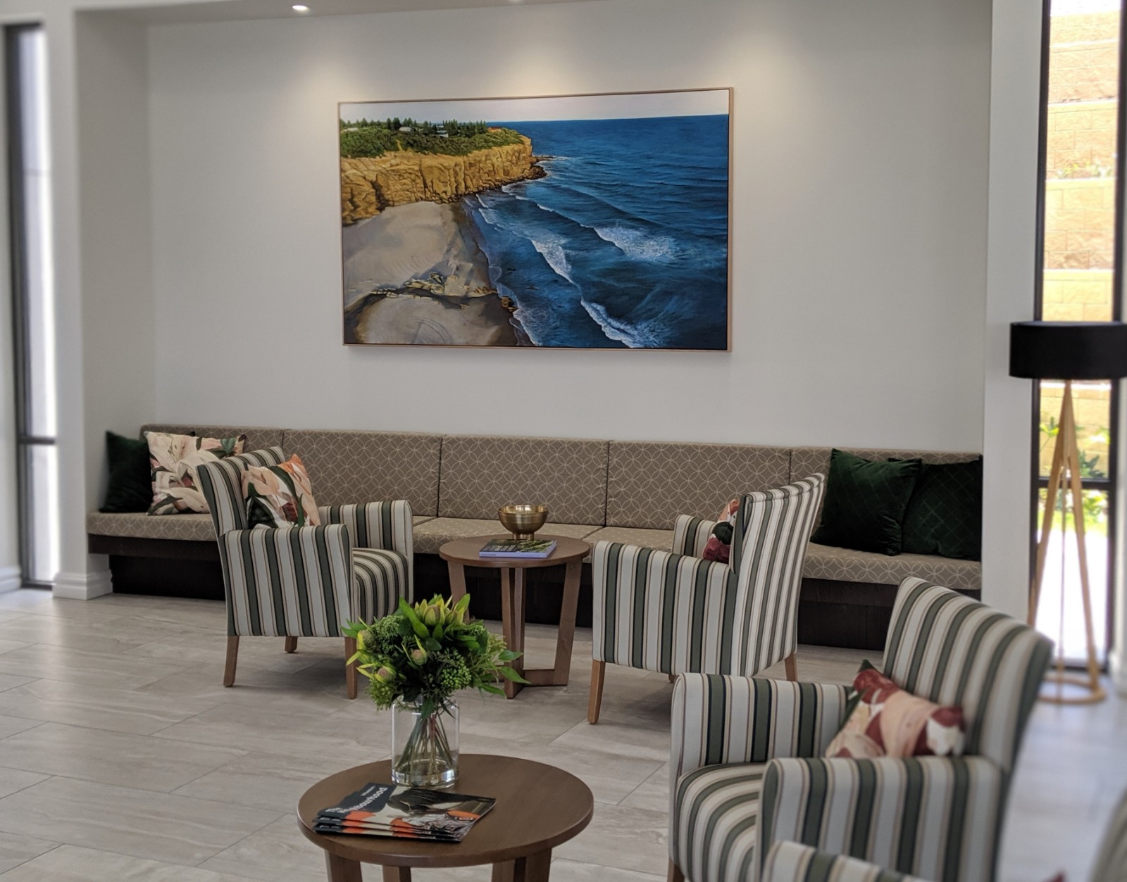 Newcastle aged care home entrance foyer with artwork and seating