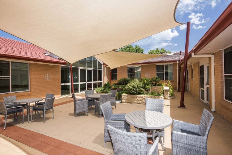 Outdoor seating area filled with space for residents to socialise at Whiddon's aged care home in Mudgee.