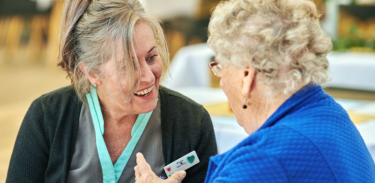 Whiddon carer is having a conversation with a client