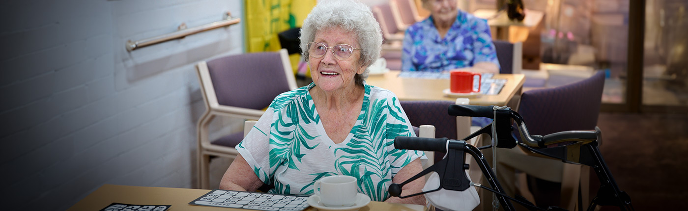 resident enjoying morning tea