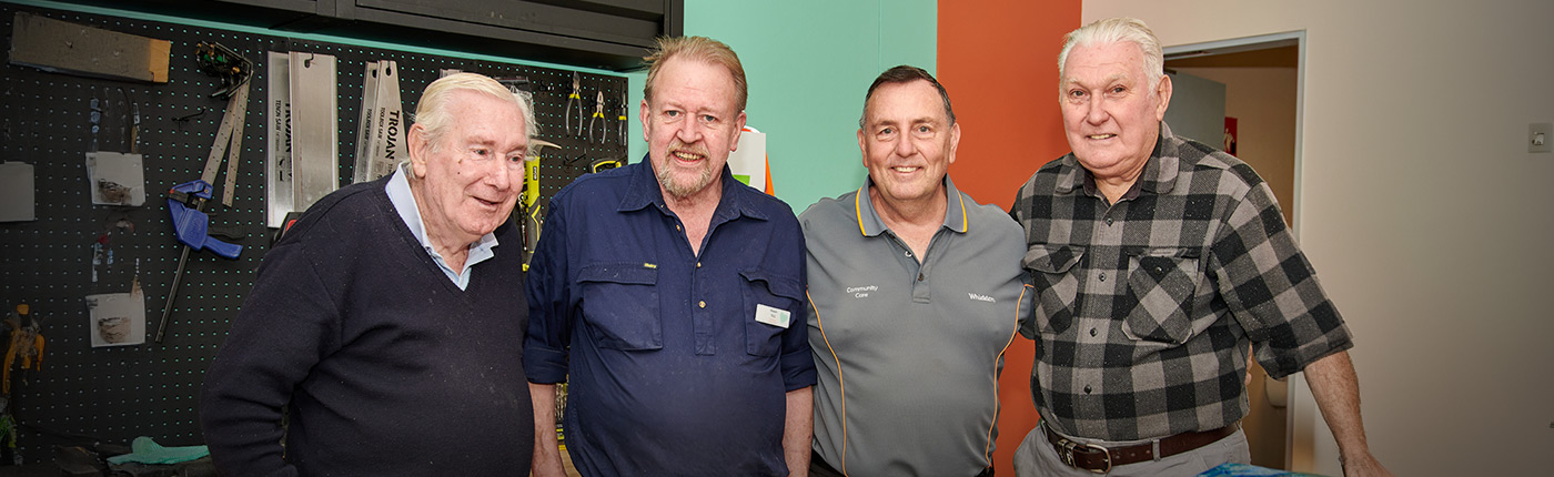 male residents in men shed with male leisure manager