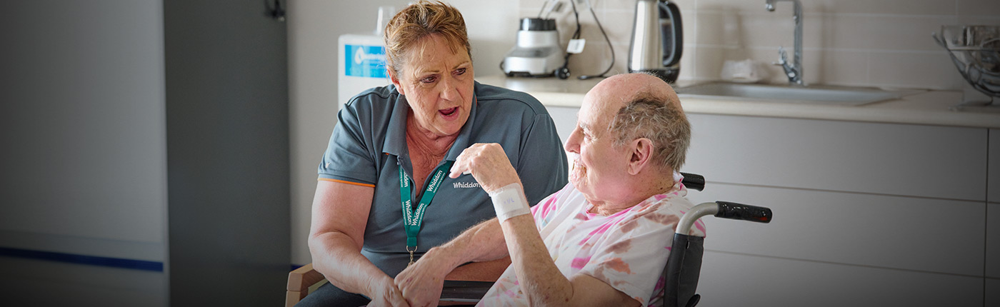 employee talking to resident