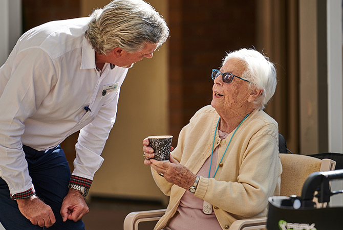 Whiddon employee, talking to the resident