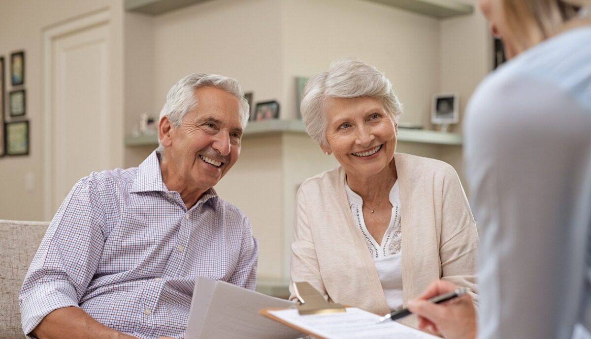 older couple meeting with advisor to discuss home care plans