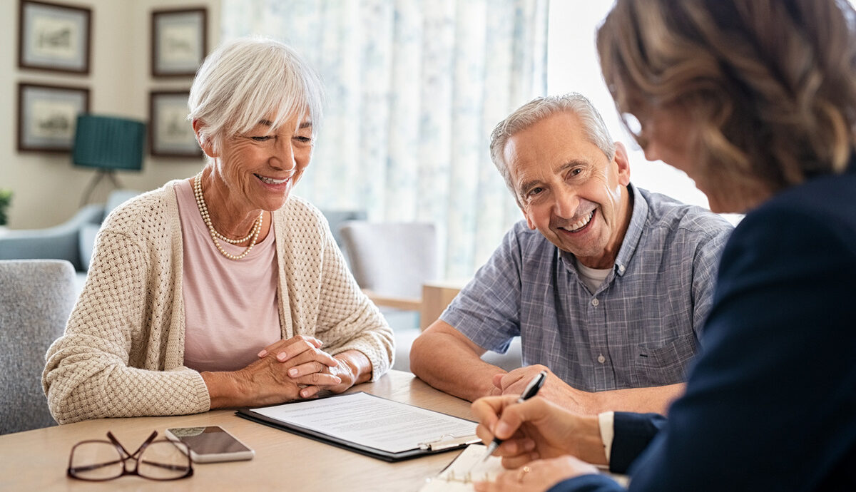 older couple consulting with support worker