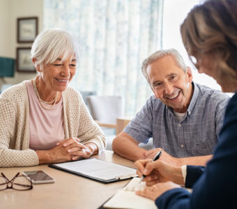 older couple consulting with support worker