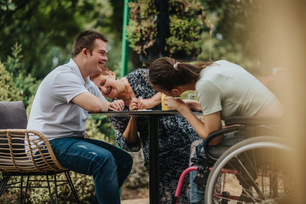 group of people with disability enjoying an outdoor gathering