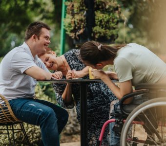 group of people with disability enjoying an outdoor gathering